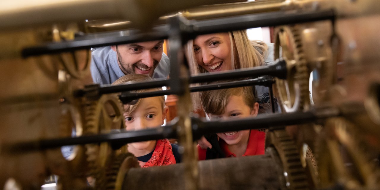 family looking through old artfact